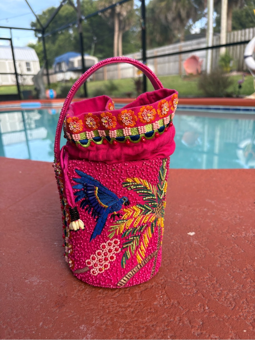 Handcrafted Pink Embroidered Bucket Bag with Parrot Detail